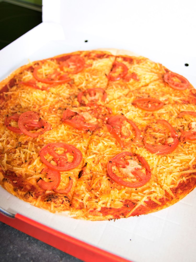 vegan Pizza aus dem Restaurant mit Wilmersburger